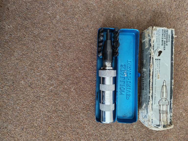 Stallion reversible impact driver with 13 bits. 