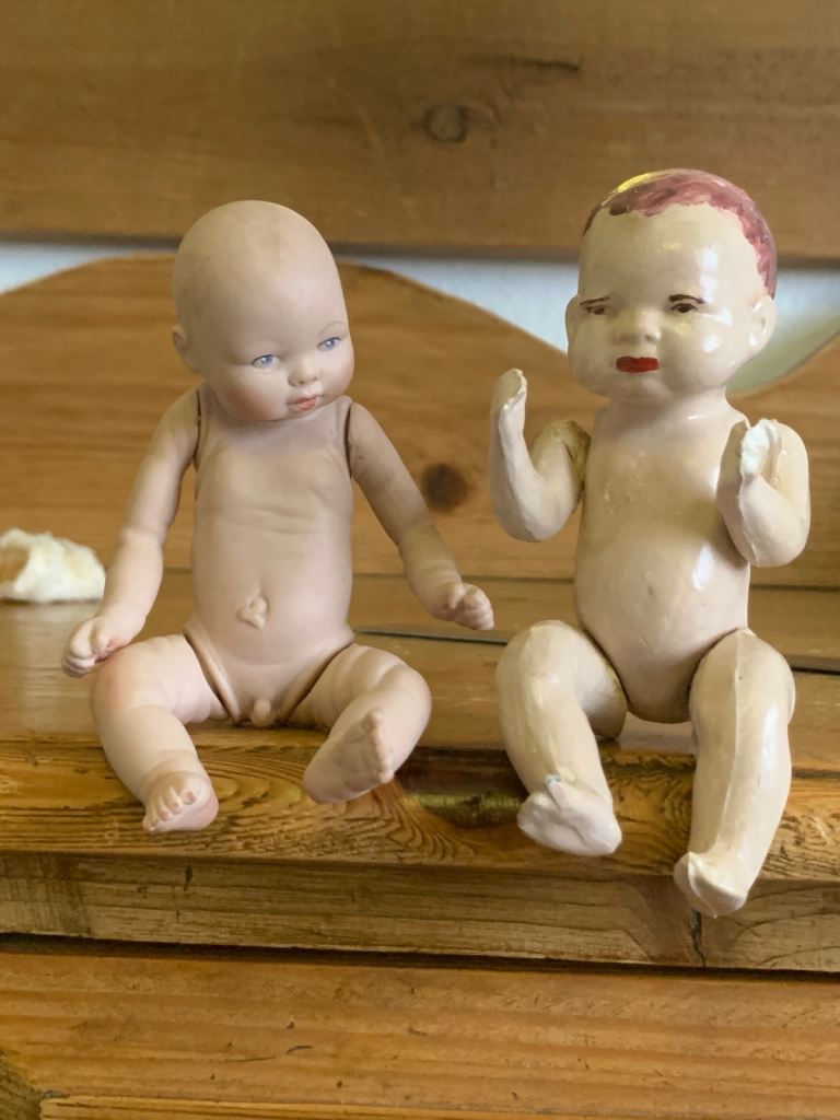 2 vintage dolls, 1 from 1985, 1 eatlier bisque doll