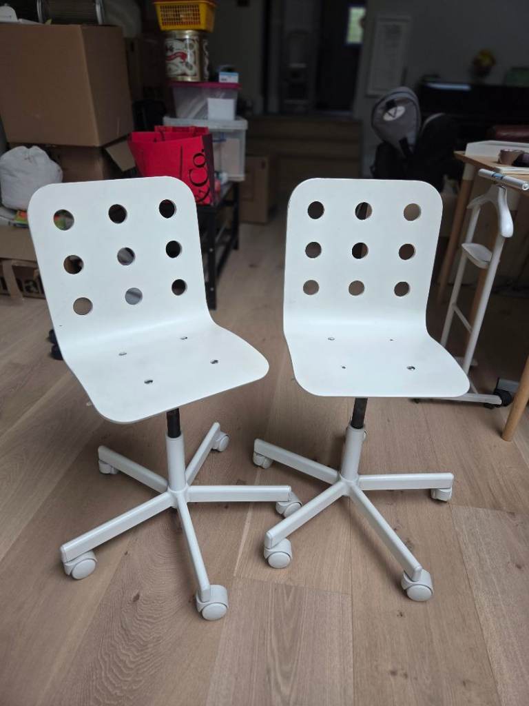 Pair of White IKEA Junior Jules Swivel Chairs with Wheels