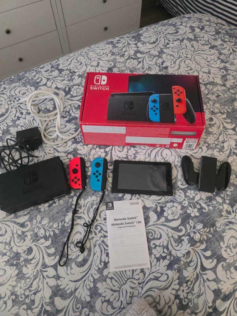 Nintendo Switch Console with Joy-Cons and Pikachu Case
