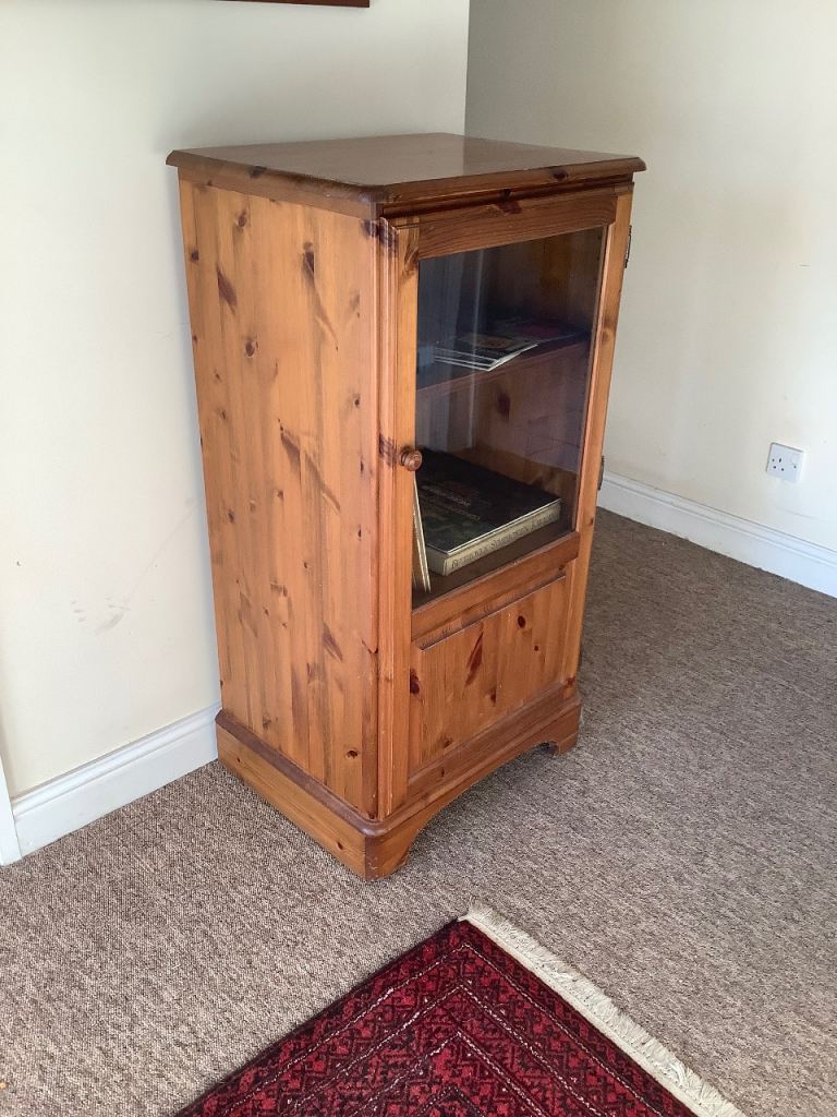 Tall wooden record player cabinet