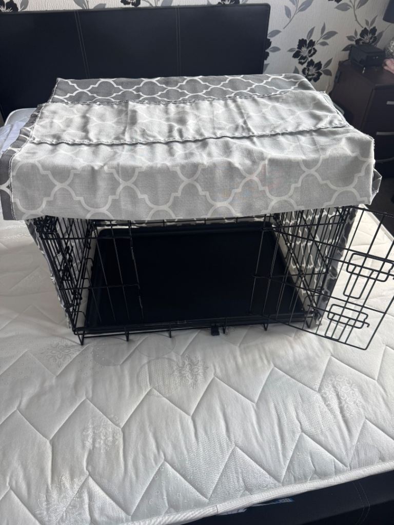 Dog cage and cover.