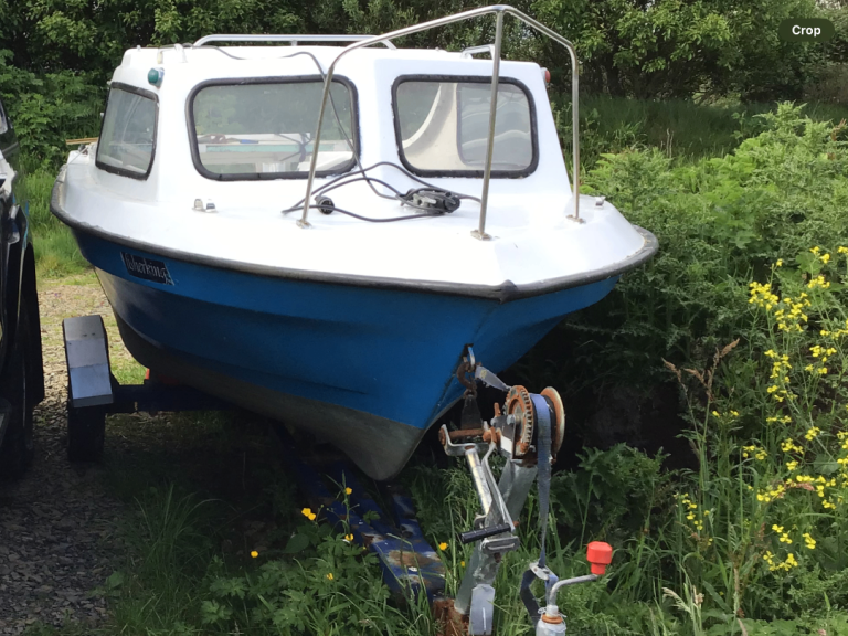 15 foot cabin boat with 10hp Honda 4 stroke and trailer