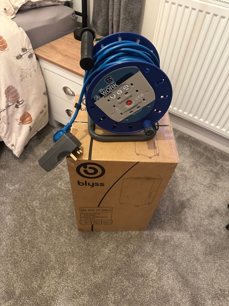 Dehumidifier and cable reel with breaker brand new used once 