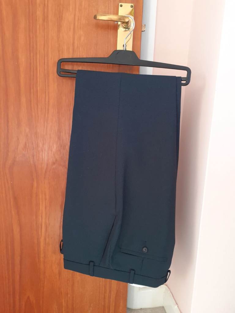 TWO PAIRS. REDUCED PRICE. Men's smart trousers. M and S. Petrol colour. Size 36. Leg 31. Stretch