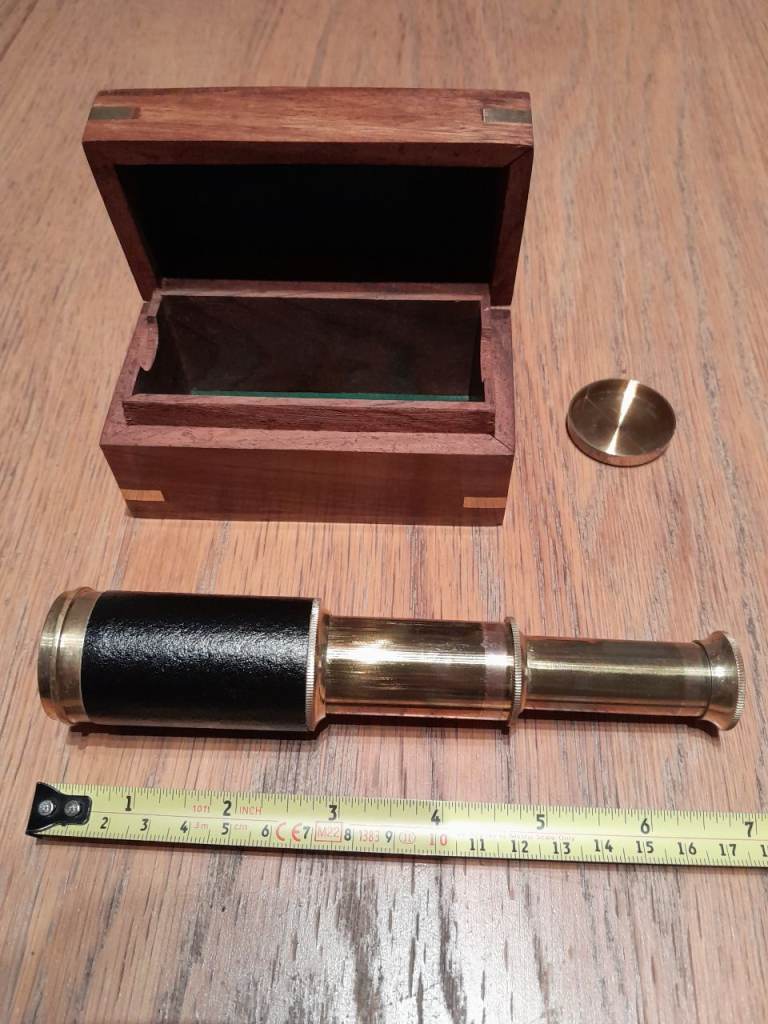 Brass telescope and wooden inlaid box