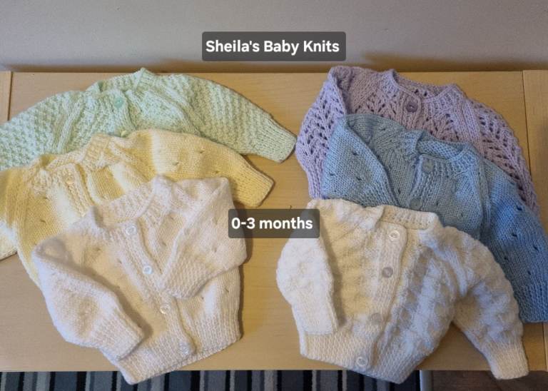 New hand knitted baby cardigans 
