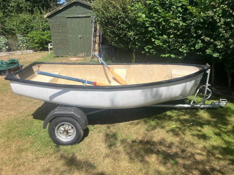 Small Boat with Trailer and Oars – Good Condition