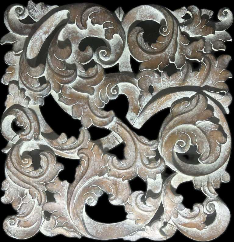 Carved wood panel with elaborate scrolling foliate decoration enclosed within a square frame.