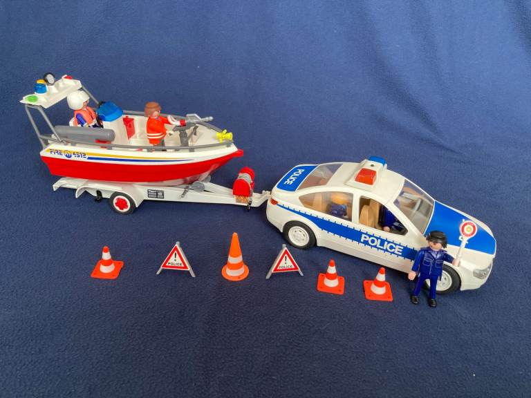 Playmobil police car, fire boat and trailer
