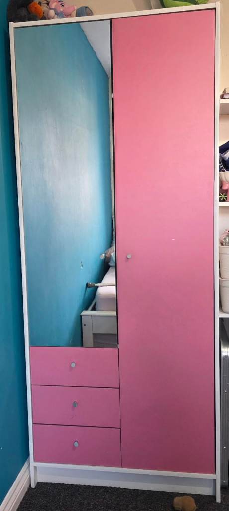 Pink mirrored wardrobe