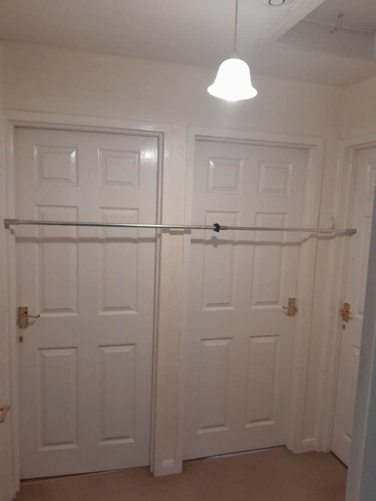 Extendable shower/curtain pole. 