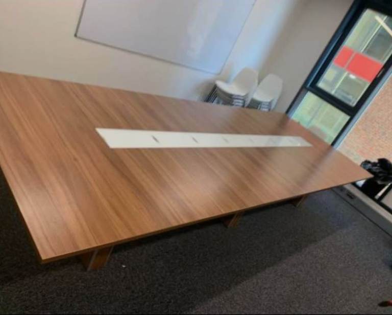 Pre-owned extra large executive boardroom Conference meeting office table - wood finish glass middle