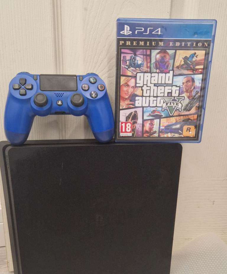 Sony PlayStation 4 slim Console with Blue Controller and Grand Theft Auto V