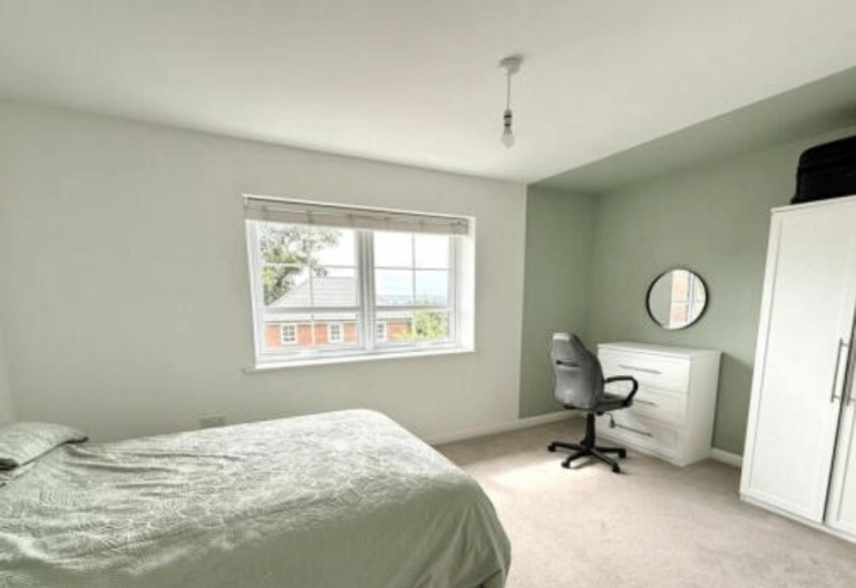 Light double bedroom in modern 2 bedroom house 