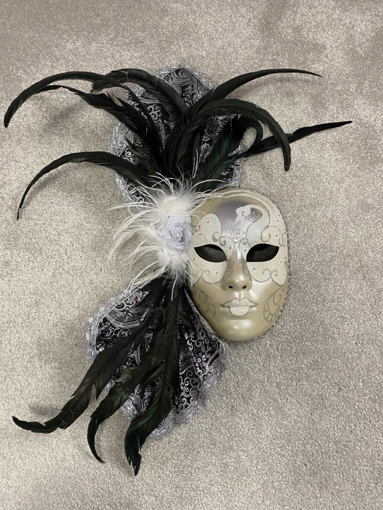 Italian style mask with feathers 