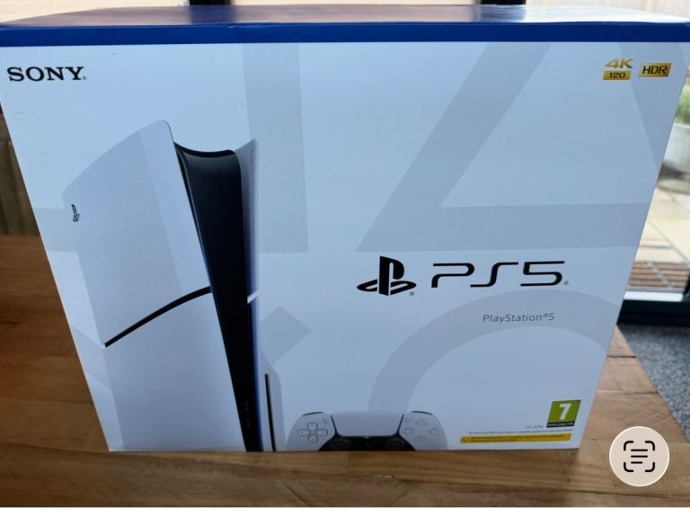 PS5 PlayStation with 2 controllers and 2 games 