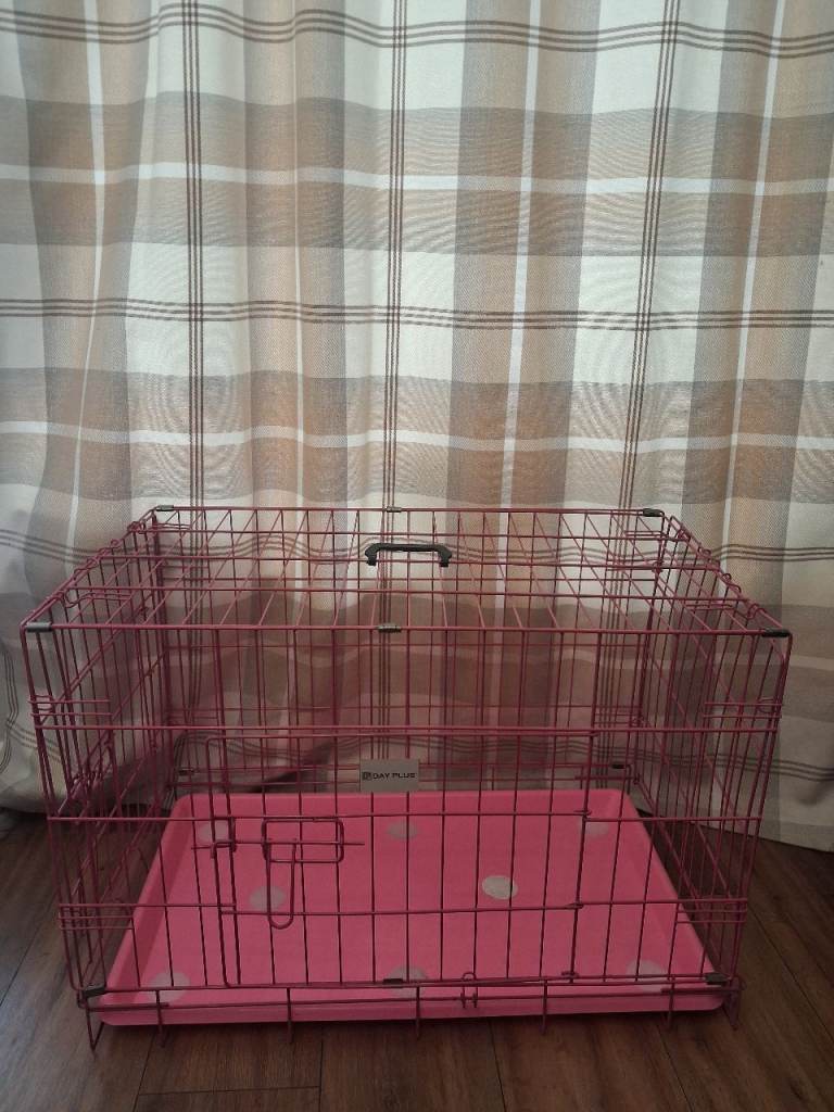 Pink dog crate 