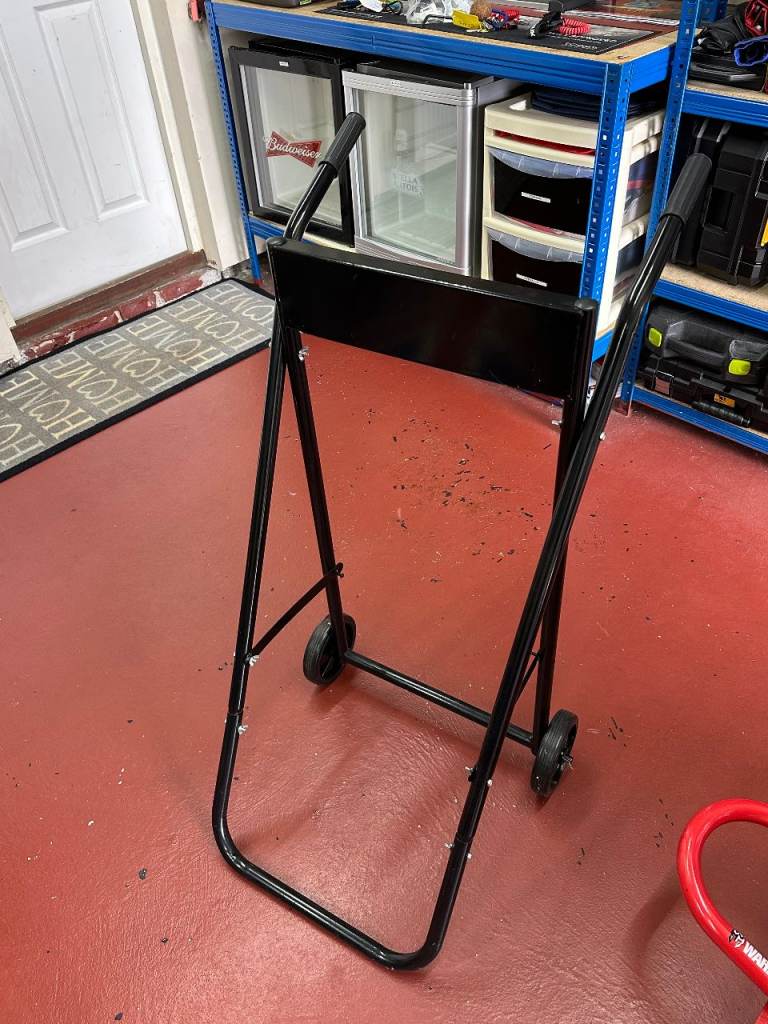 Boat outboard engine trolley stand