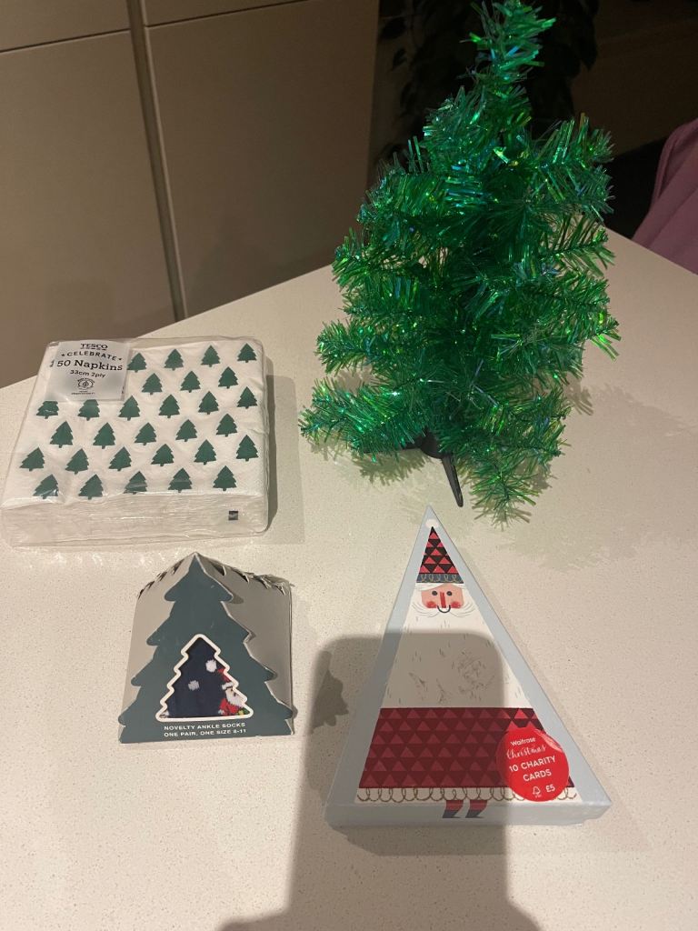 Small Christmas tree, Totes socks, Christmas cards and napkins. £10. Chichester