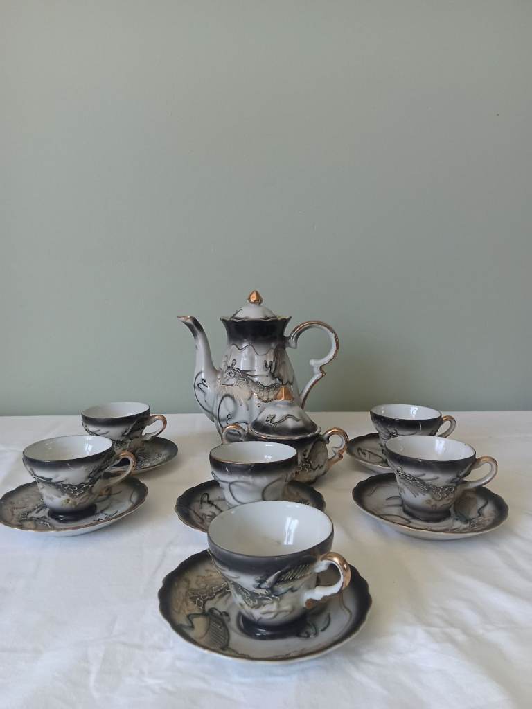 Black embossed dragon coffee set