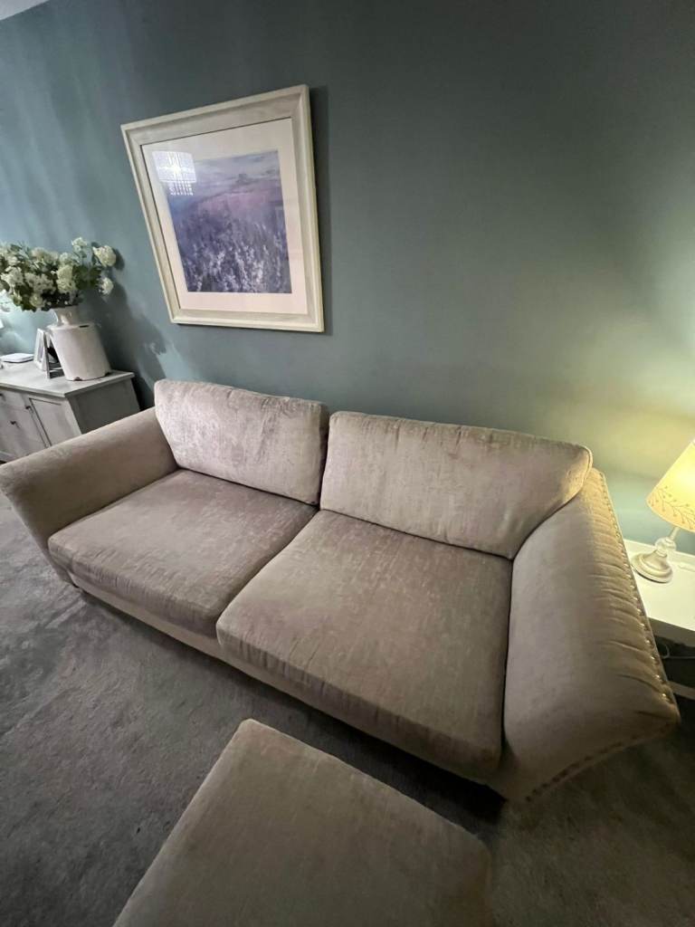 Grey DFS sofa and foot stool