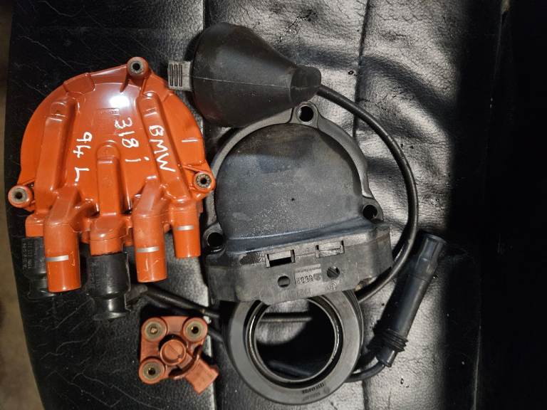 Bmw 318i distributor and rotor arm , cover etc