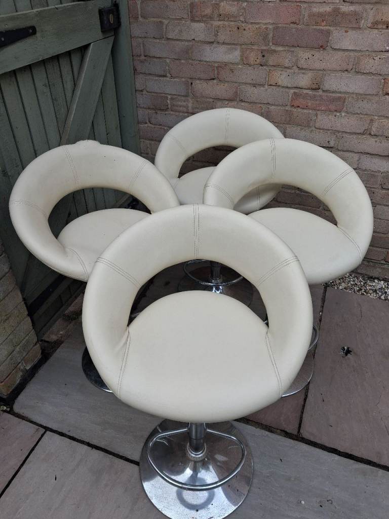 4 cream and chrome adjustable height bar stools