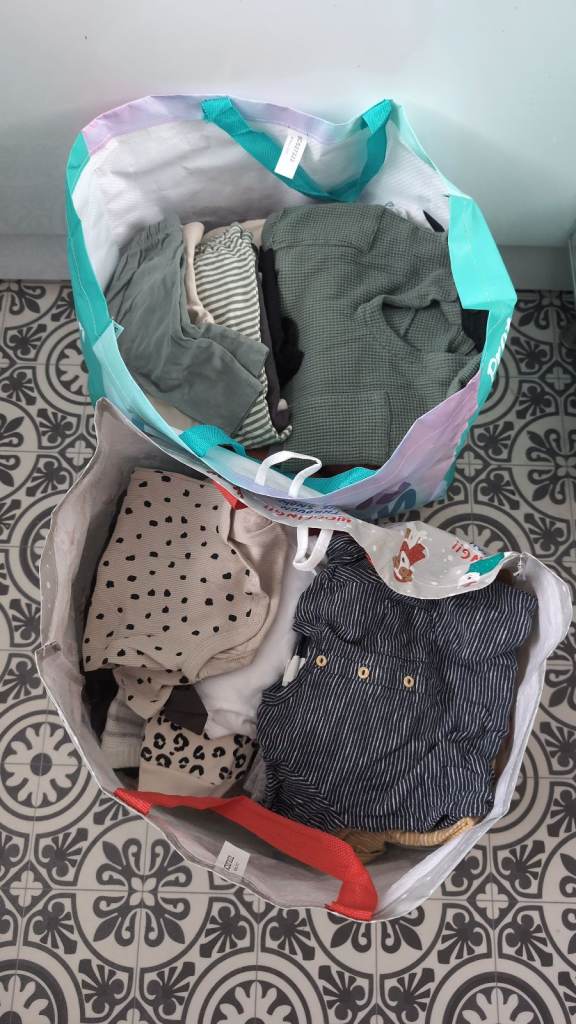 2 bags of baby clothes
