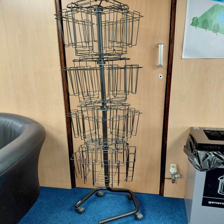 Rotating leaflet stand for shop front