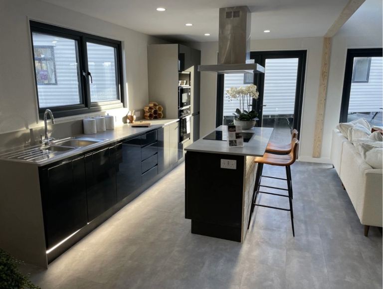 £260k RRP Unused Show Lodge – £24,950 Clearance – Solar + Blueprints – Re-Site Option (North Wales).