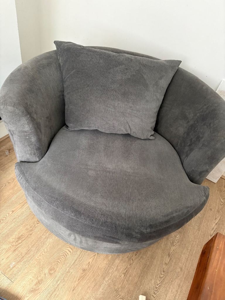 Grey swivel cuddle chair 