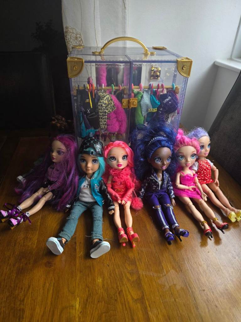Rainbow High Dolls with accessories and a fashion closet
