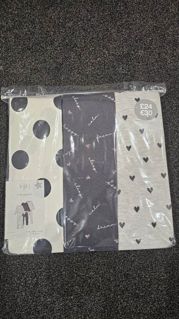 New Unopened pack of 3 pairs of girls pyjama sets - 10 to 11 years