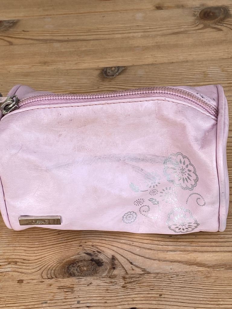 Pink faux leather next make up bag with zip. £1. Can post or collect f