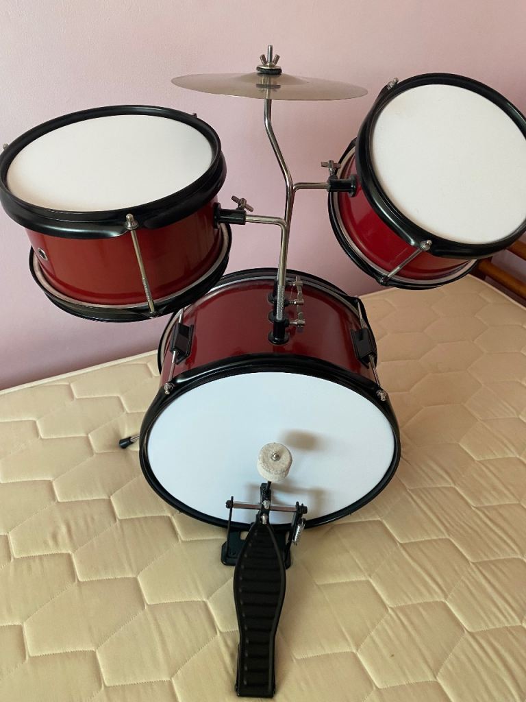 Child’s drum set and chair 