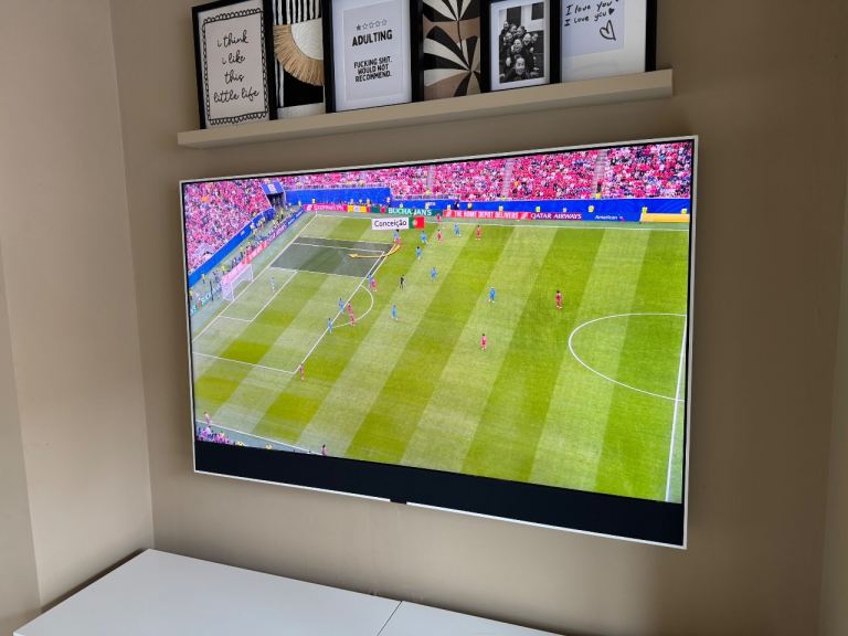55-inch Wall-Mounted Smart TV – Good Condition