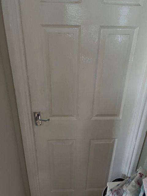 Up to four white internal wooden panel doors
