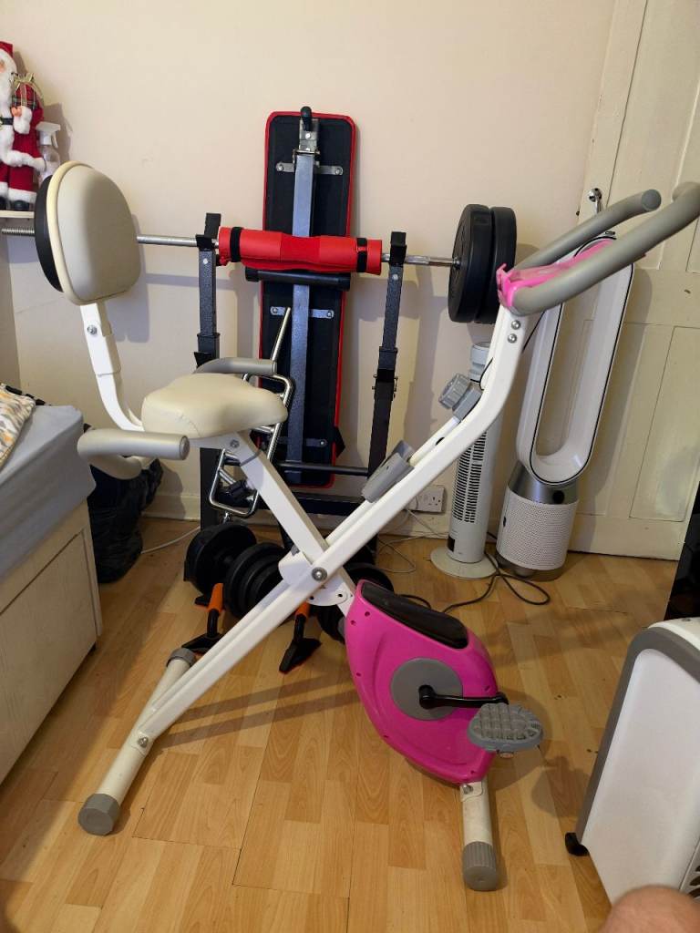 1. Home Gym Multi-Gym — Great Condition,Full home gym set included with weights and bars.