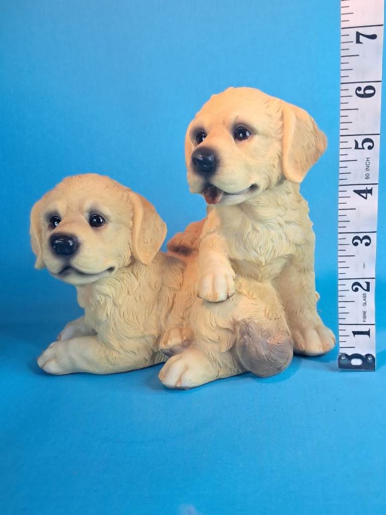 Large hand-painted resin figurine of two Golden Retriever puppies