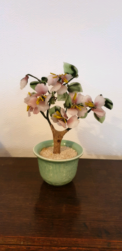 Decorative artificial plant in ceramic pot