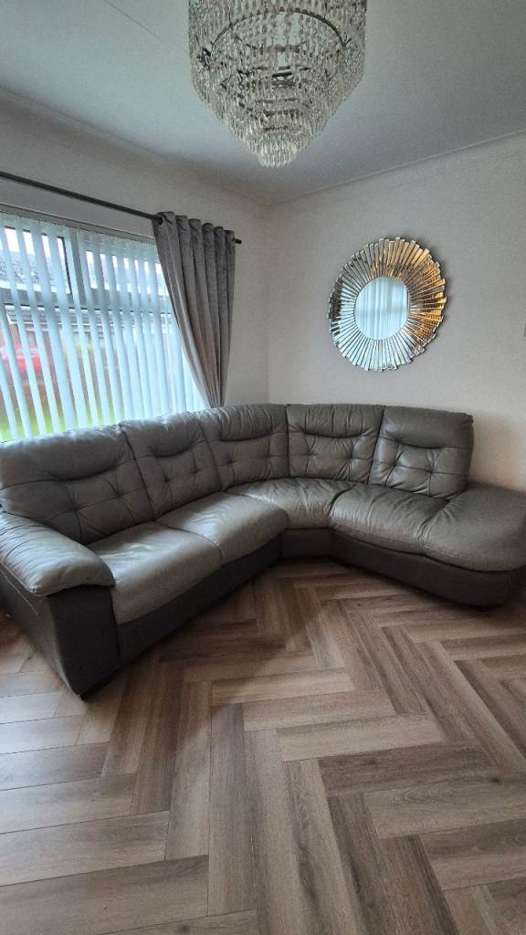 Grey real leather corner sofa and 2 x person cuddle chair 