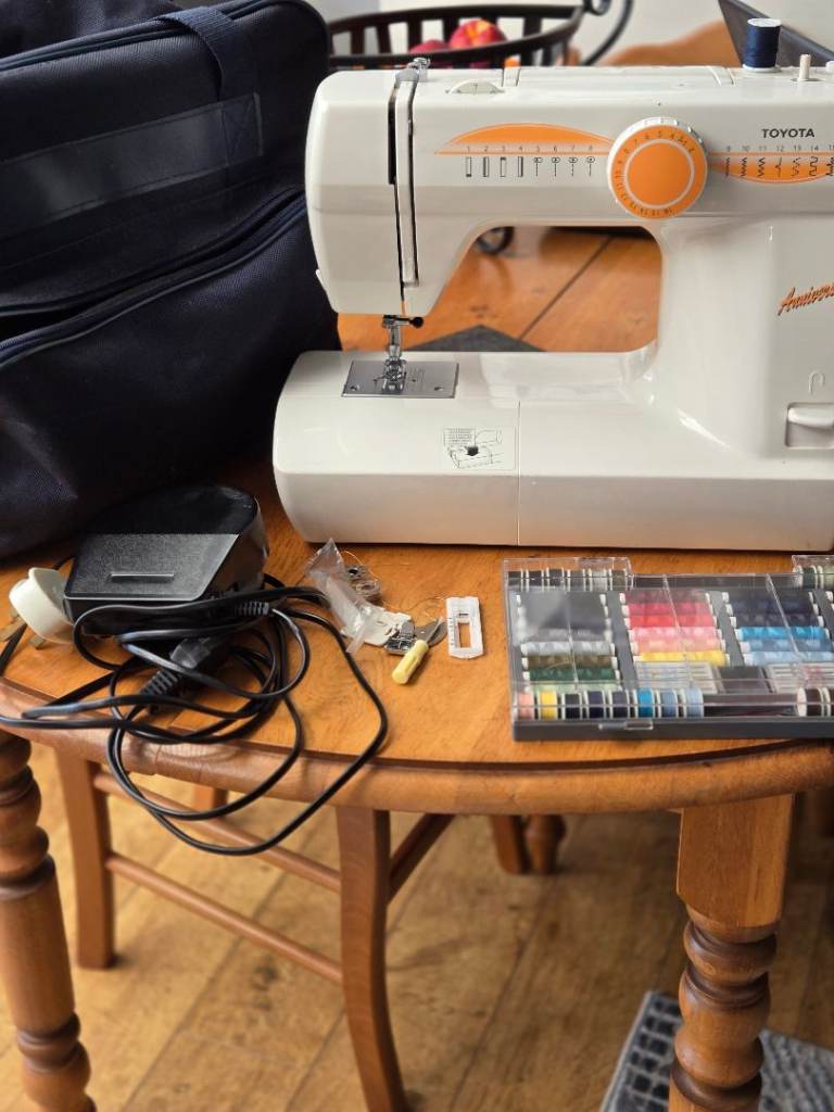 Toyota Sewing Machine – Good Condition, with Accessories