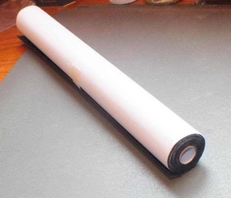 Black self adhesive roll of repair fabric (New)