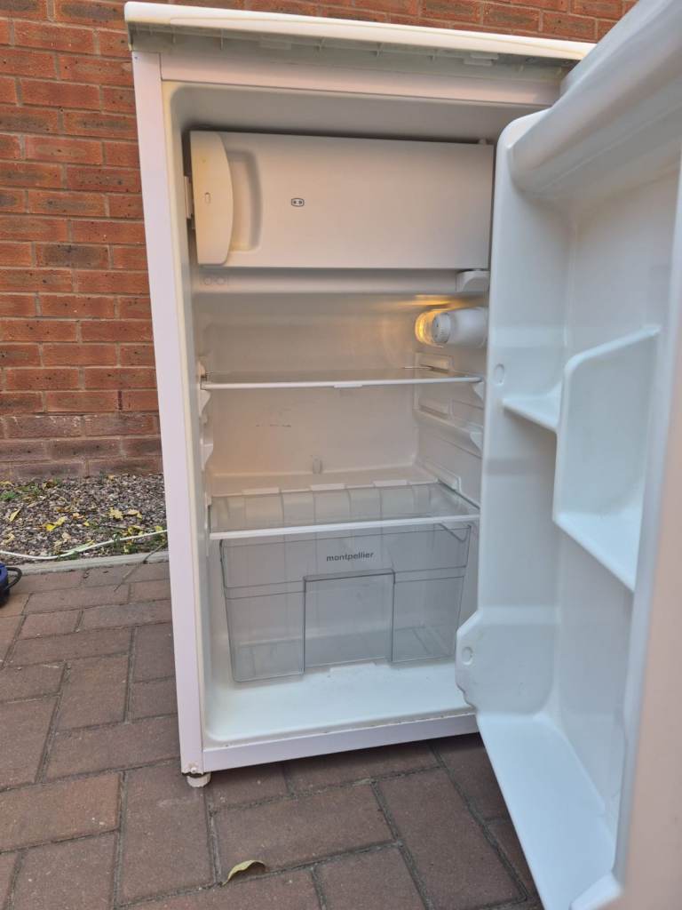 Undercounter fridge with freezer compartment, can deliver for extra cost 