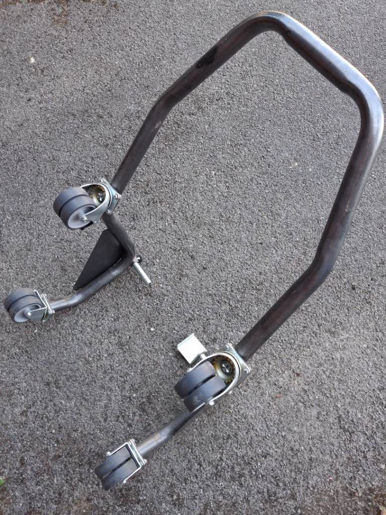 Motorcycle rear wheel paddock stand