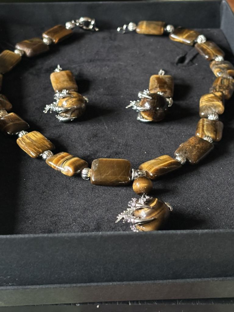 A Substantial Tiger’s Eye Necklace and Earrings.