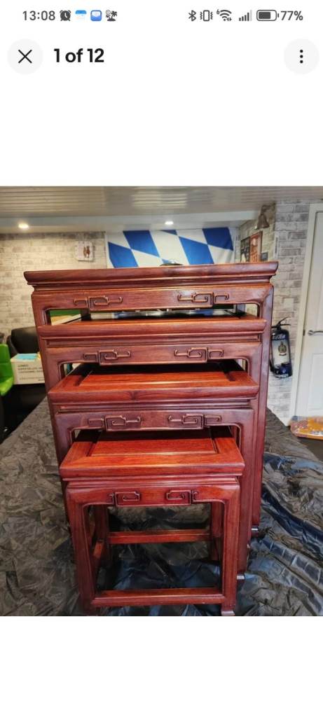 CHINESE ROSEWOOD CARVED NEST OF TABLES SET OF FOUR ON STRAIGHT LEGS