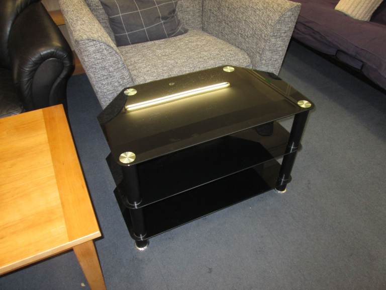 image for BLACK GLASS TV STAND at HAVEN TRUST CHARITY SHOP