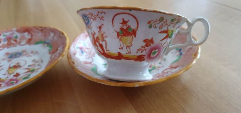 Chinese Porcelain Cup and Two Saucers